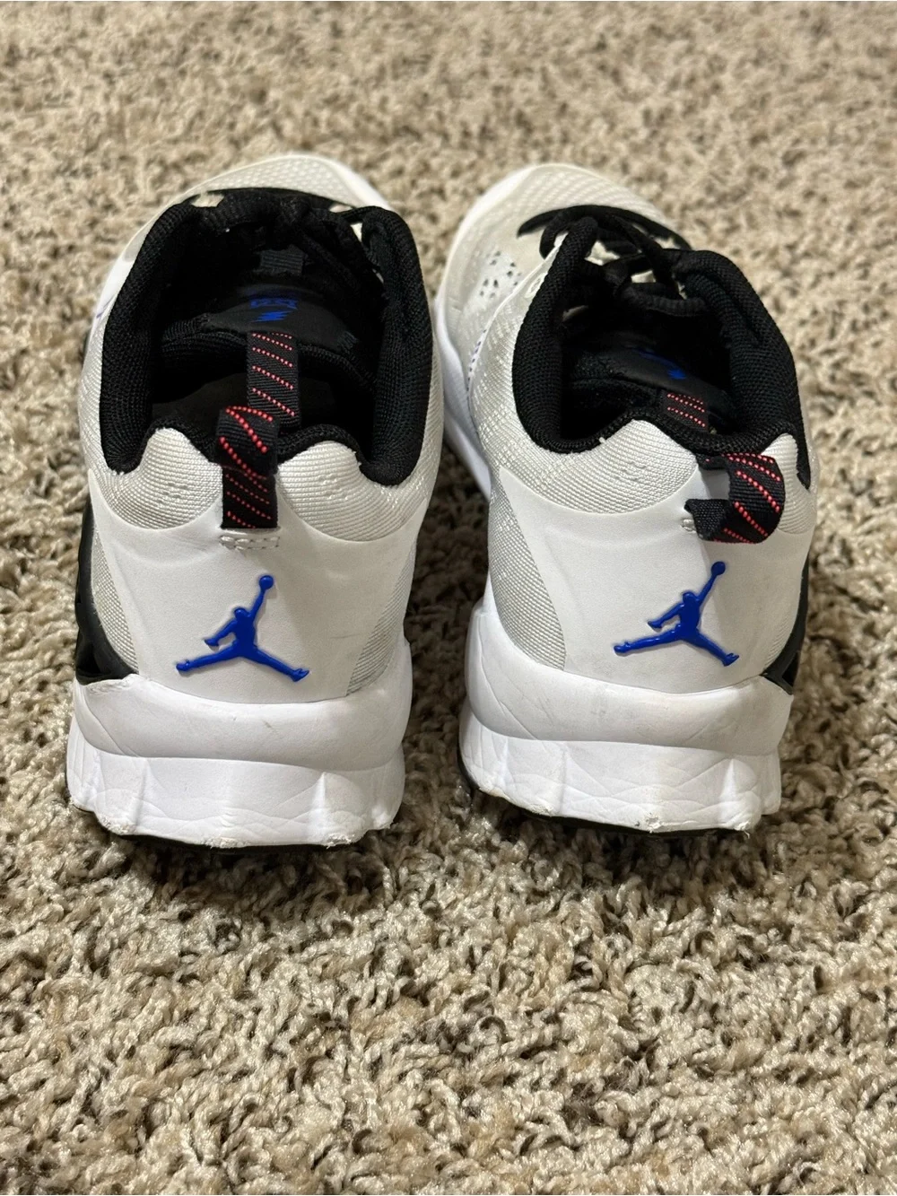 Jordan Men's White Athletic Shoes with Black and Blue Accents
